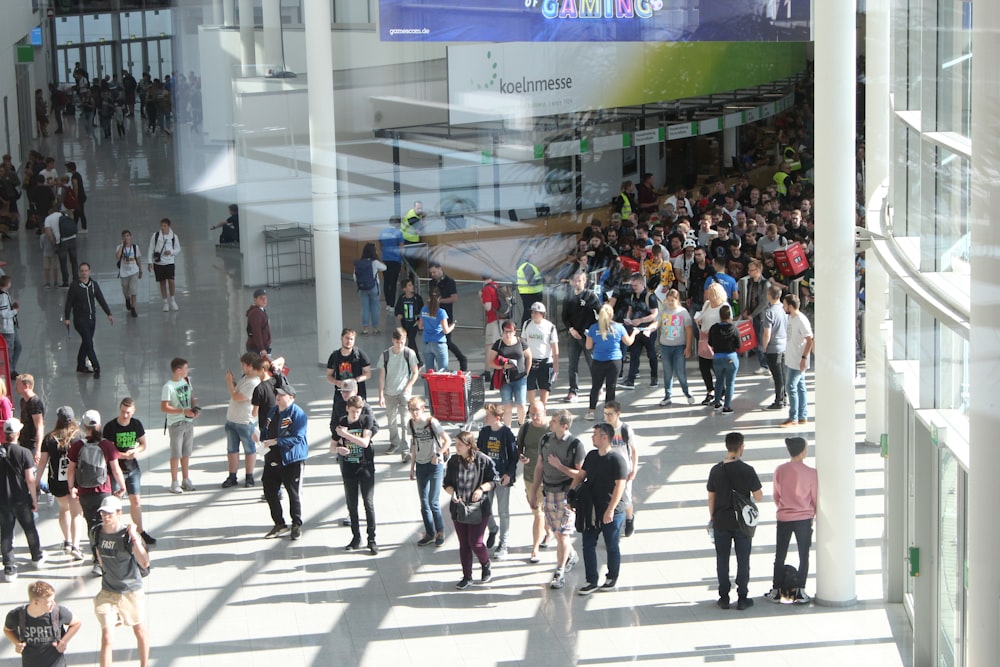 Young people entering Gamescom 2019 shot from an elevated position